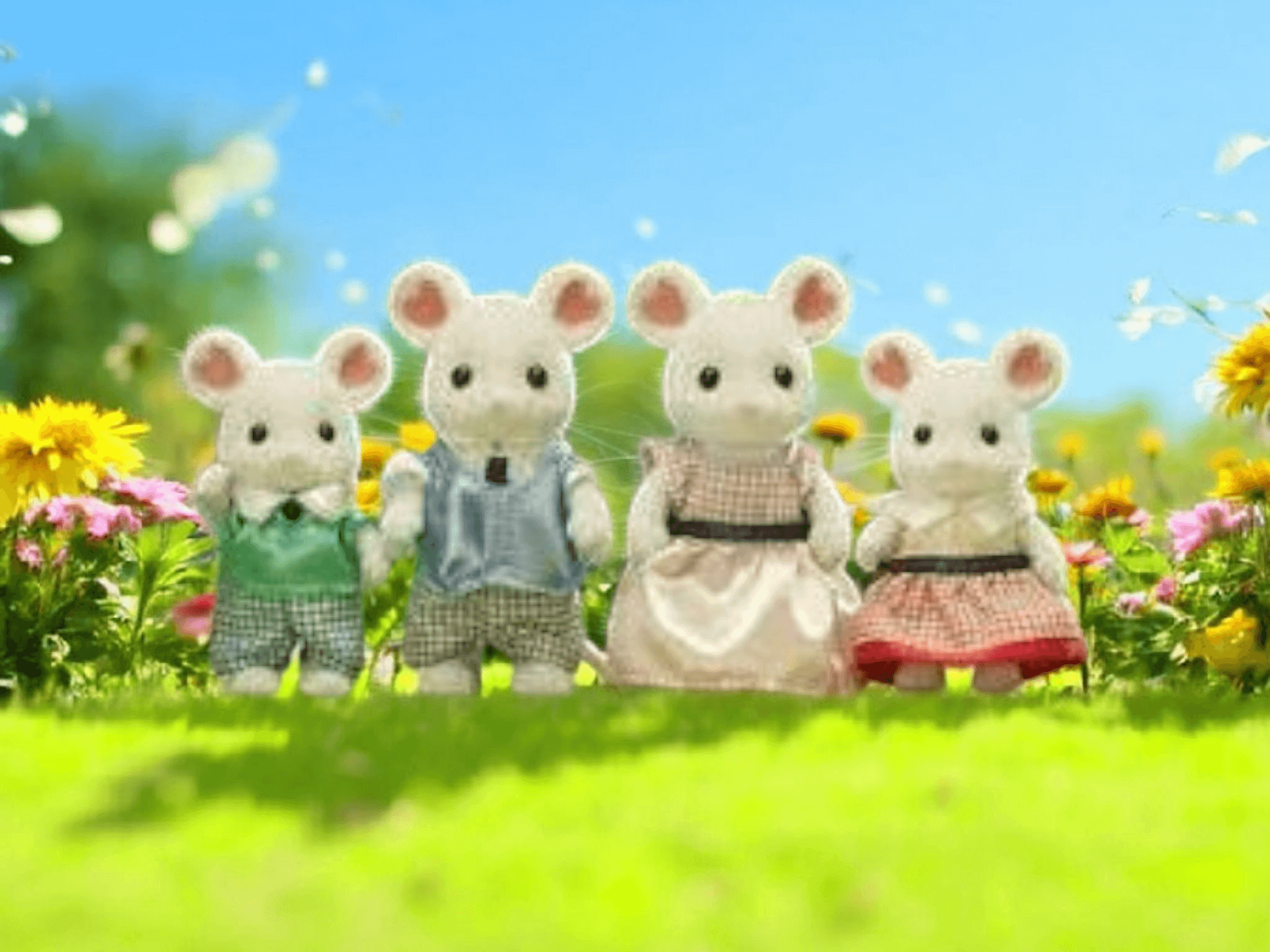 Sylvanian Families Buying Guide: Where to Start Your Collection featuring adorable mouse characters in a flower field.