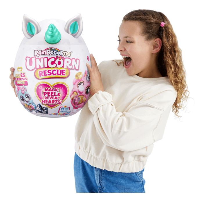A picture of a child holding a giant Suprise toy